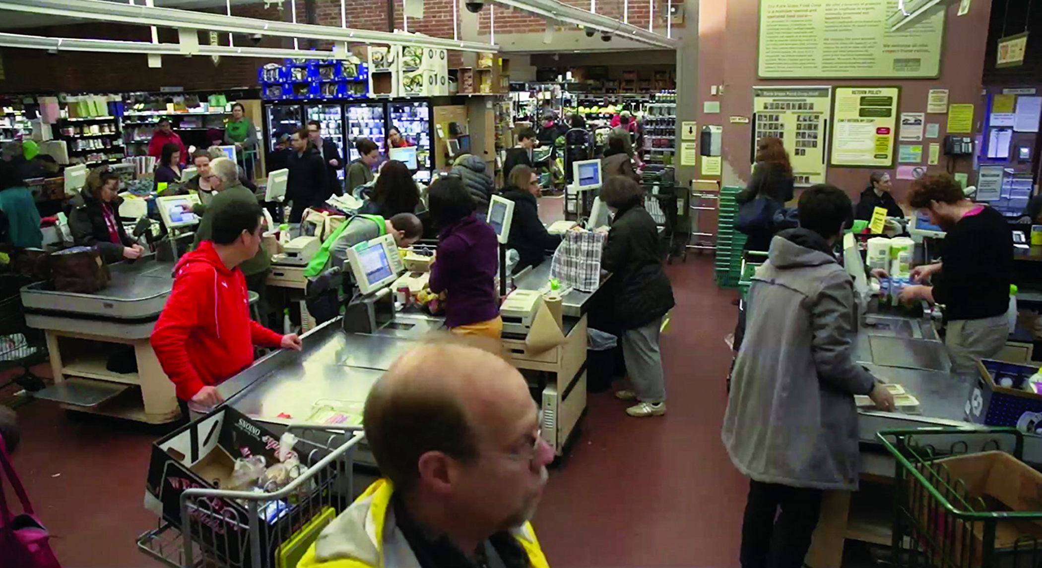 Co-op members lined up at the checkout counters.